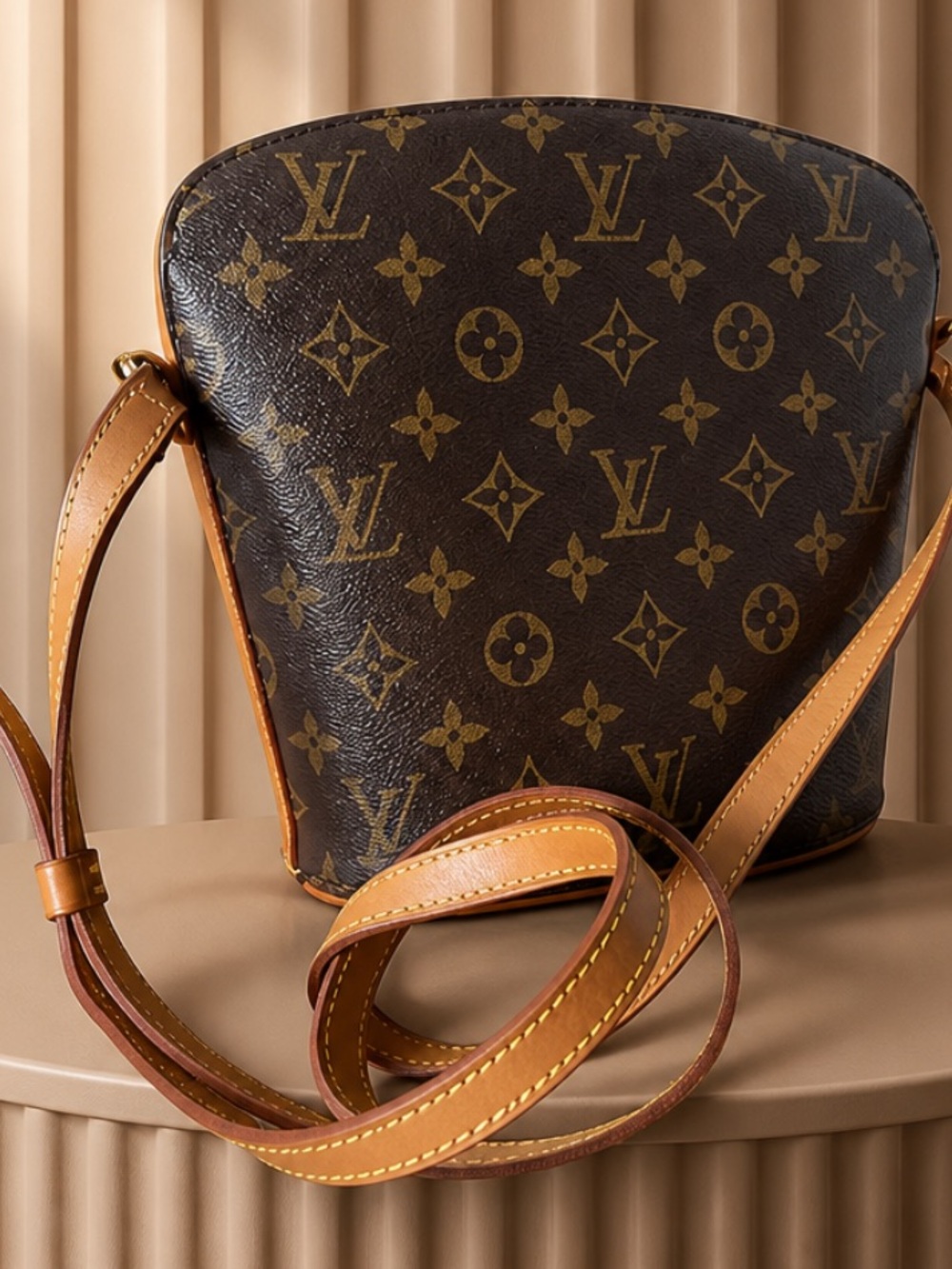 Louis Vuitton Monogram Drouot Crossbody Bag in Brown and Tan.